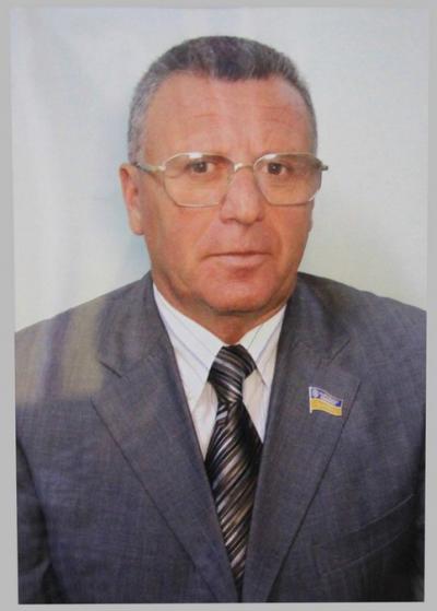 Народный депутат Украины IV созыва, заслуженный работник сферы услуг Украины